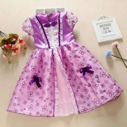 Purple and pink girls princess dress with floral print and bow decorations, short sleeves, ankle-length, ideal for Halloween or birthday parties.